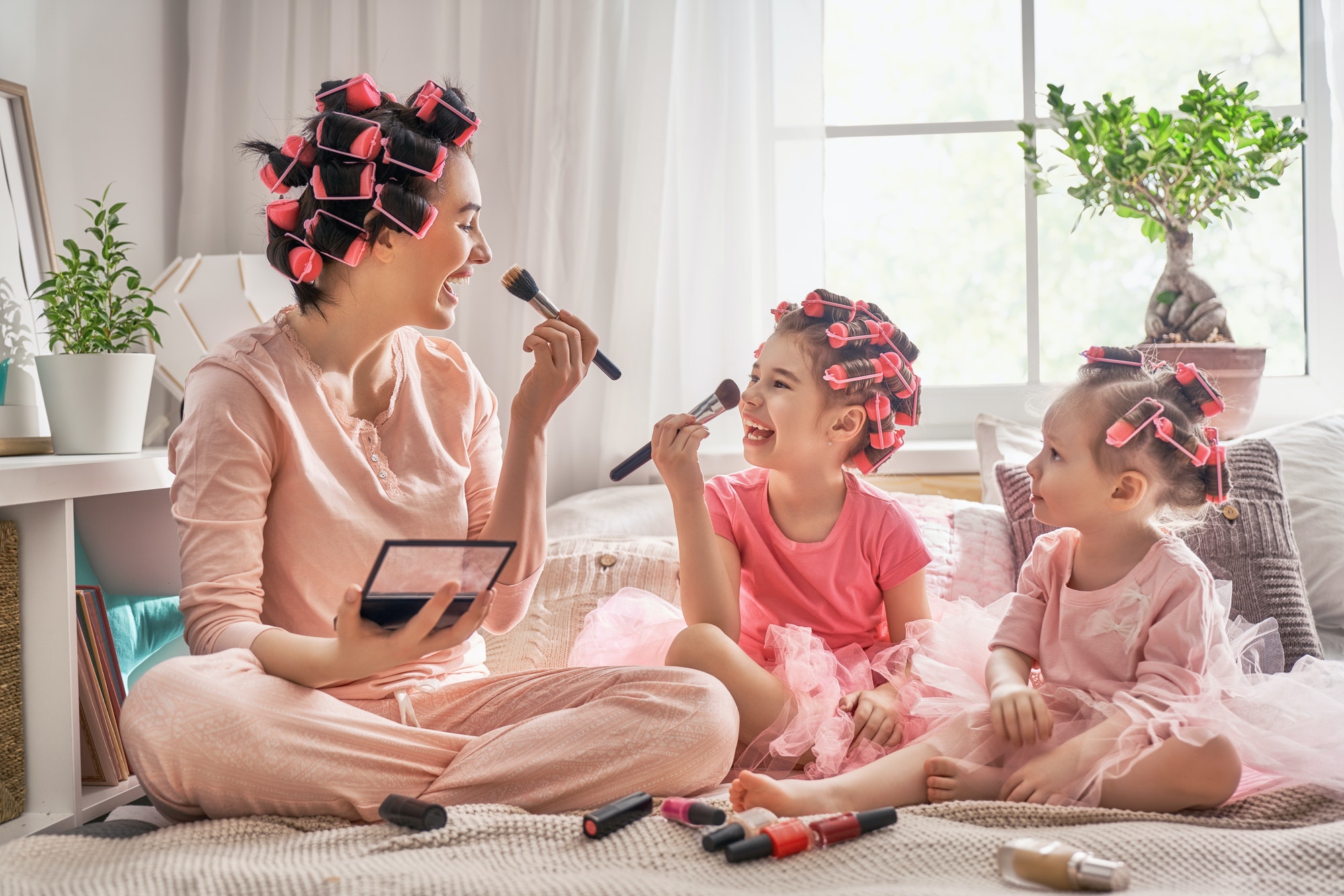 Mom and children doing makeup